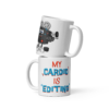 Funny "My Cardio Is Editing" ceramic mug featuring a muscular film camera illustration for video editors, filmmakers, and content creators.