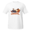 Funny freelancer t-shirt featuring a relaxed person working on a laptop with “Working…” text